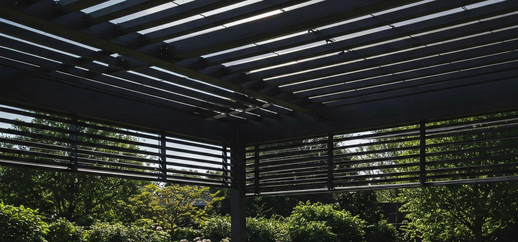 Modern pergola with adjustable slats