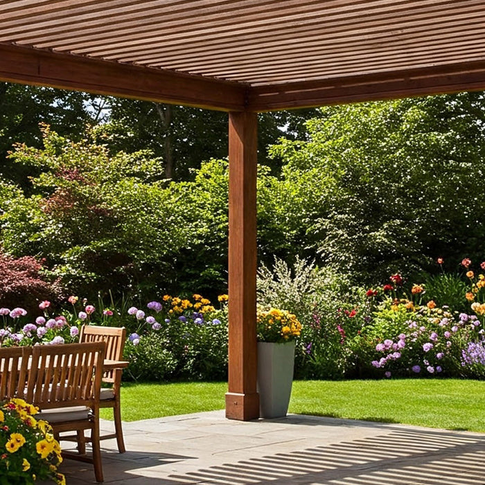 A wooden pergola with adjustable louvers, casting dappled shade on a patio.