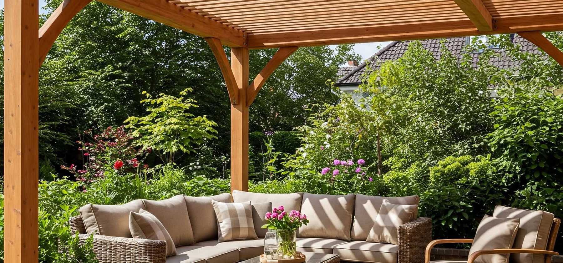 A wooden pergola with a patio set underneath