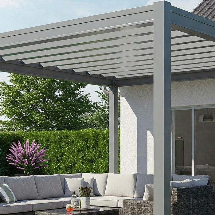 Aluminium Pergola Wall Mounted onto a White House, Which Has Patio Doors