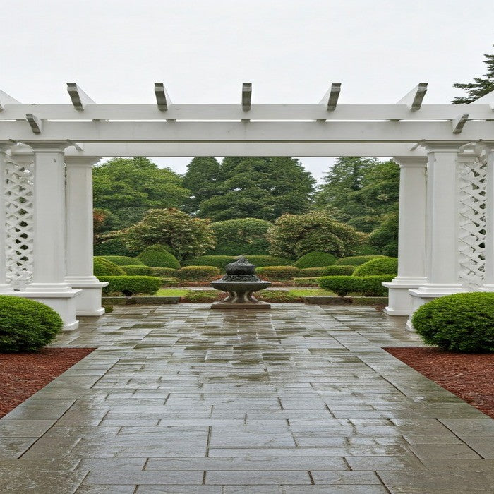 Large White Pergola within beautiful garden setting on a rainy day