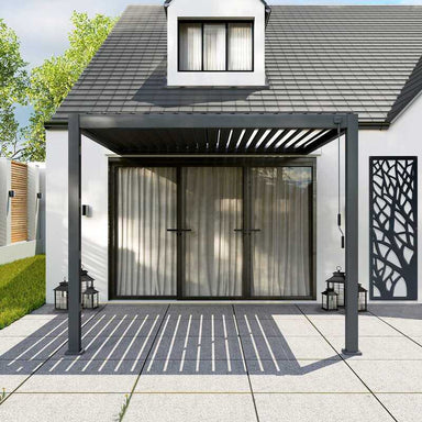 Wall Mounted Pergola with roof slats slightly open, positioned against a white walled house and patio doors