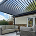 Aluminium pergola showing an open louvred roof, slts fully open