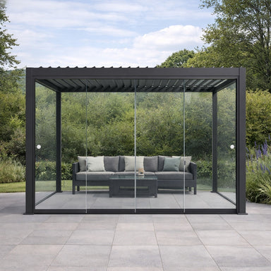 Nova Titan Pergola with Clear Glass Sliding Doors in Grey on landscaped patio