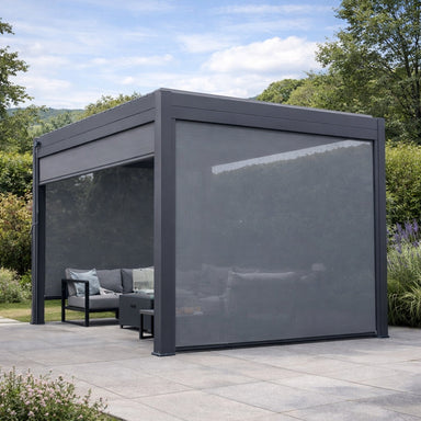 Nova Titan Privacy Pull Down Screen in Grey featured on landscaped patio