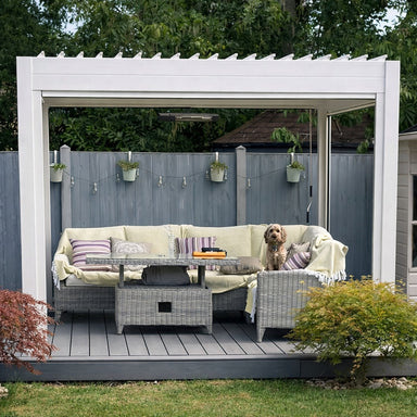 Nova Titan 3 x 3m Aluminium Pergola in Pebble with dog on seating area