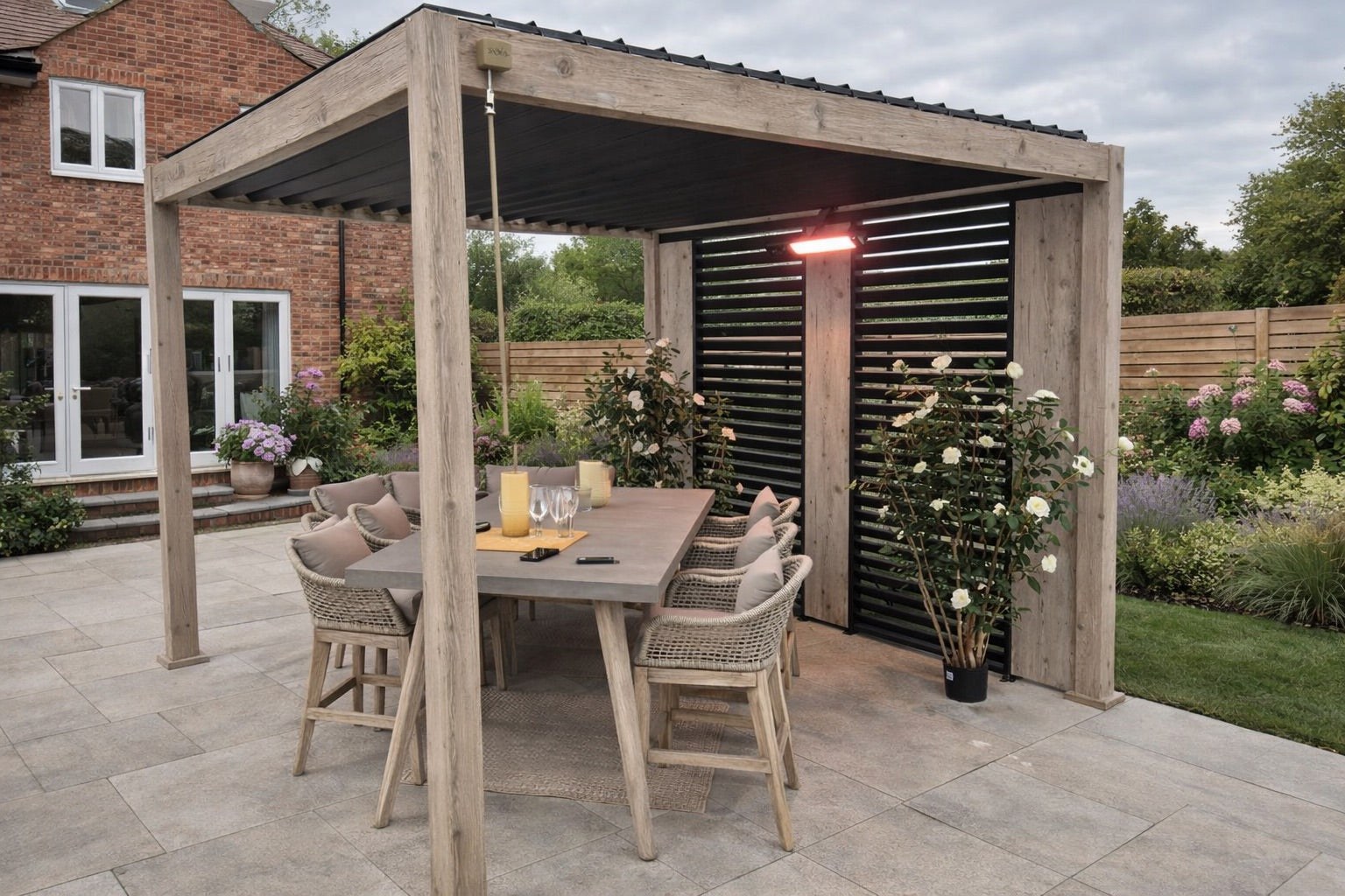 Nova Titan Aluminium Pergola 3 x 3m in Wood Look on landscaped patio with dining set