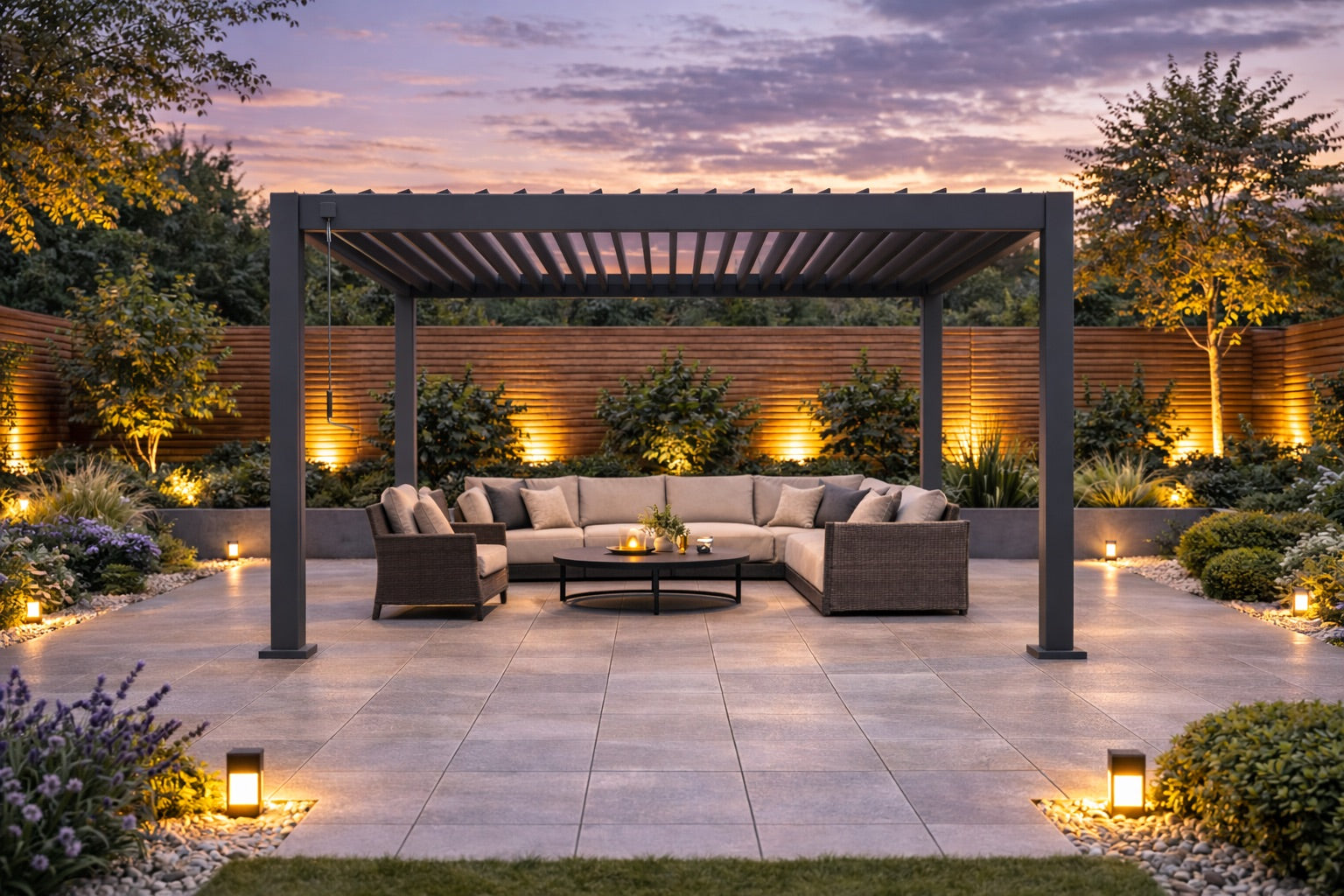 Nova Titan Aluminium Pergola in Grey - 4x 3m lifestyle image on landscaped patio with sunset