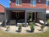 Nova Titan 5.3x3m aluminium pergola in grey customer image on patio