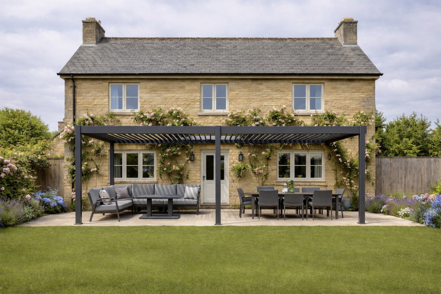 Nova Titan 6x3m Pergola in lifestyle setting with lounge and dining set