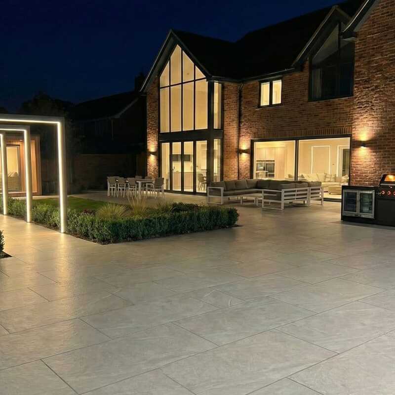 Patio image with Nova titan pergola arch in the background